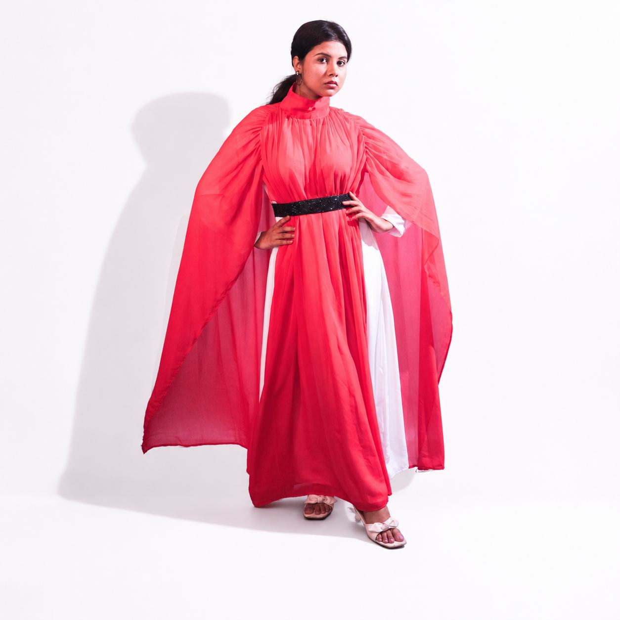 Coral Pink High Neck Cape Sleeve Gown with Black Waist Belt